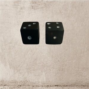 Black Dice Made with White Dots and Metal